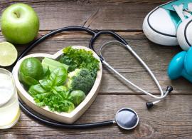 An image with a heart-shaped bowl with green vegetables, a doctor's stethoscope, pair of running shoes, hand weights, a glass of water, and a green apple