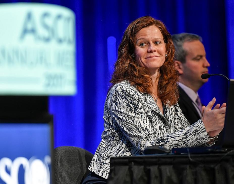 Dr. Ann Partridge at the 2017 ASCO Annual Meeting. This is a candid photo of her smiling while clapping and looking to her right, while on a speaking panel.