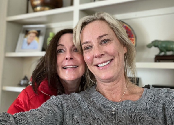 From left to right: Molly and Martha next to each other taking a selfie.