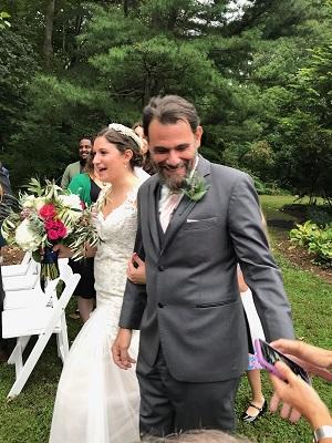 Dr. Yaeger's patient walking his daughter down the aisle on her wedding day