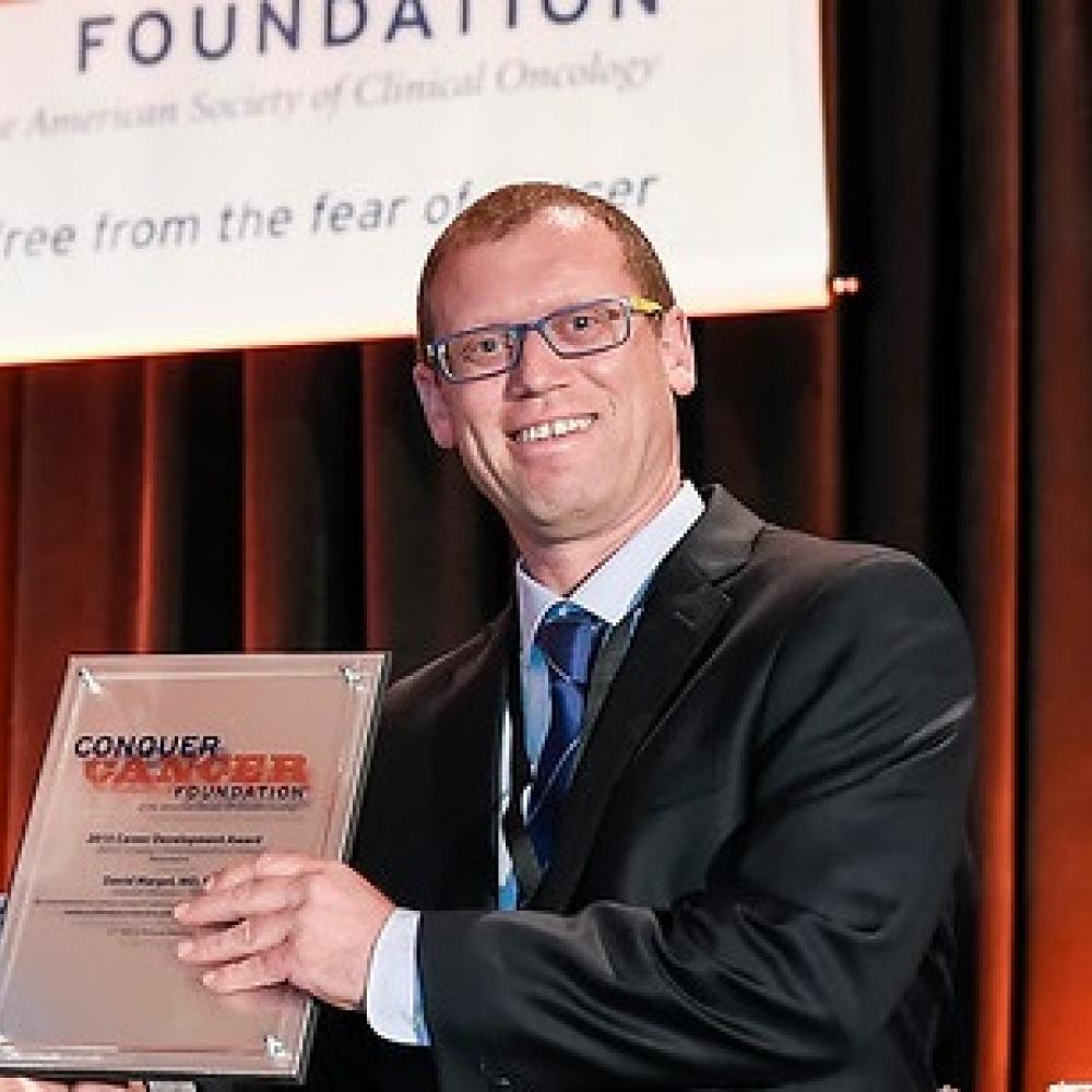 Dr. David Margel at ASCO 2015 Annual Meeting, receiving his Career Development Award plaque.